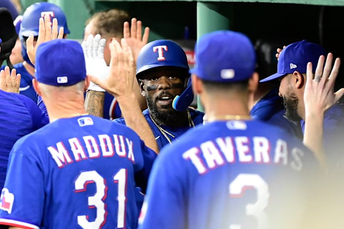 Texas Rangers right fielder Adolis Garcia (53) celebrates his two-run home run against the Boston Red Sox during the sixth inning at Fenway Park.
